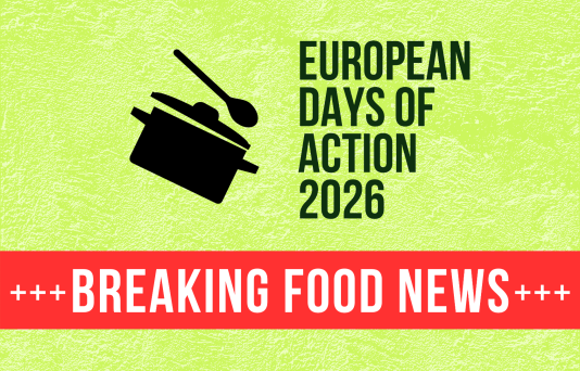 people marching in the streets with a banner 'farming - food & climate justice now'
